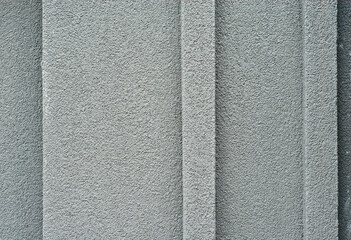 Plaster on a gray wall. Concrete wall texture close up.
