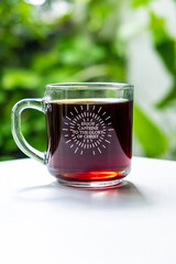 Cup of coffee in transparent glass
