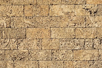 Texture of brick wall and concrete blocks. Samples of stone plates stacked evenly in a row.