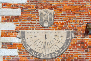 Sundial made using the sgraffito technique on the wall of Sandomierz gothic Town Hall, Sandomierz, Poland
