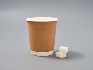disposable paper eco-friendly coffee tea cup on gray background