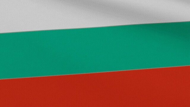 Flag of Bulgaria with horizontal white, green and red stripes waving in the wind