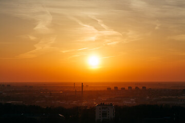 Beautiful golden sunset over the city, panoramic view