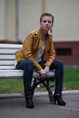 Portrait of a young beautiful girl in the park