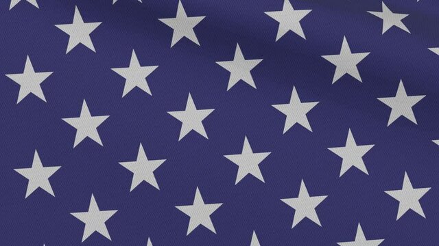 Close-up of the blue field with white stars on the waving flag of the United States