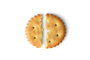 Broken salt cracker isolated on white background. Top view.