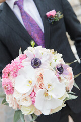 Groom with bouquet