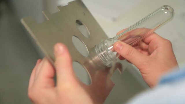 checks the pet preform in a special meter