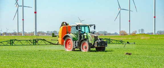 Tractor with crop sprayer in grain field 1218.jpg © Wolfgang Jargstorff