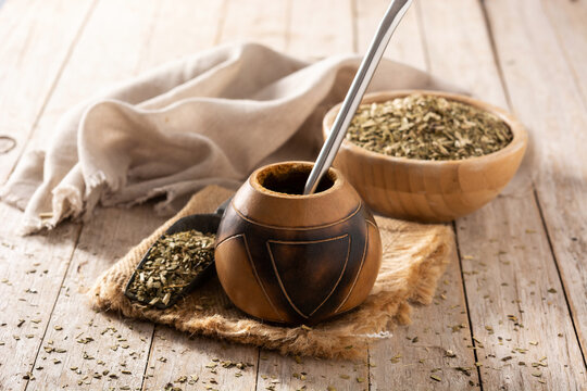 Traditional yerba mate tea on wooden table	