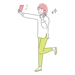 スマートフォンで自撮りをする若い女性／3色