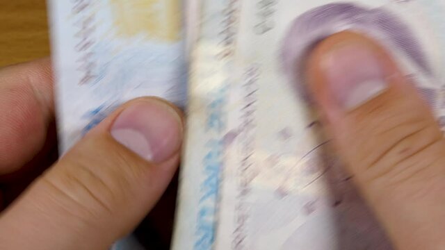 Male hands counting turkish lira bills. Business or financial concept, Money or cash revenue