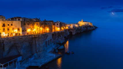 Scenic view of Vieste with the church of San Francesco by night, Gargano, Puglia, Italy