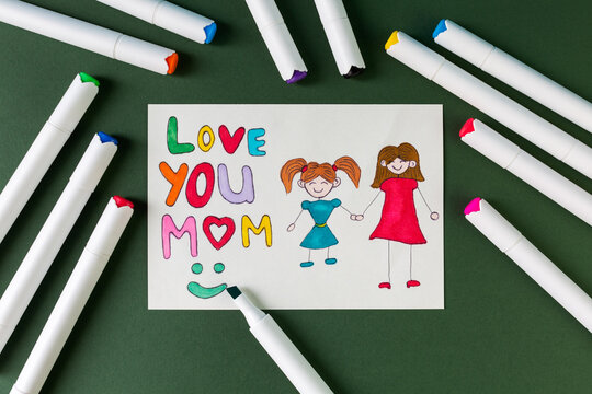 Happy mother's day. Beautiful postcard drawn by a child for mom. Green background. Love you mom