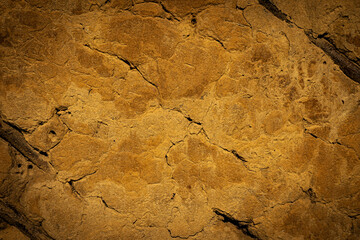 texture or background of old destroyed clay wall with wood inserts 