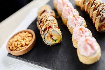 sushi rolls tempura in a beautiful setting