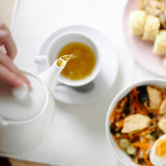 Japanese lunch of ramen, sushi and fresh tea