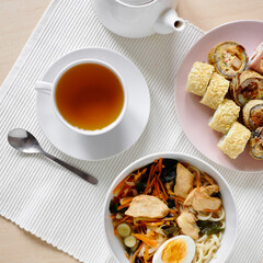 Japanese lunch of ramen, sushi and fresh tea