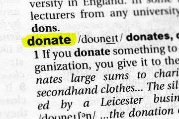 Highlighted word donate concept and meaning.