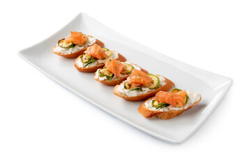 Deliziosi crostini con crema di formaggio, zucchine e salmone affumicato, Antipasti italiani 