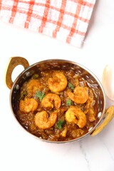 Indian food- Prawns masala or shrimp curry. Also known as Kolambi che Kalvan in Marathi. Chingri fry. Maharashtrian Prawns curry. Copy space.