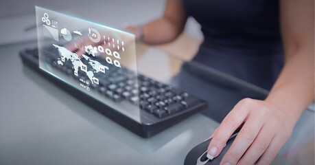 Composition of world map and digital icons on screen over woman using mouse and computer keyboard