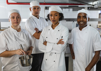 Portrait of diverse race male and female professional chefs