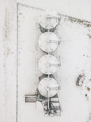 Aerial View of Modern Granary, Grain-drying Complex in snowy winter day, Latvia.