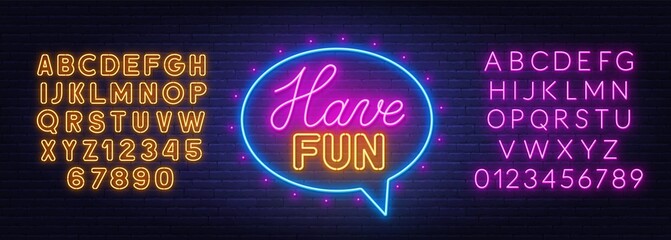 Have fun neon sign in the speech bubble on brick wall background.