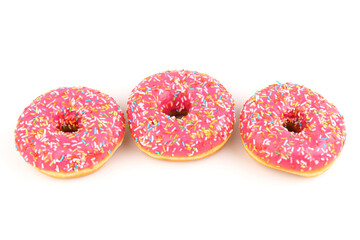 Fresh made Donuts isolated on white background. Doughnuts are traditional sweet pastries. Copy space for text.