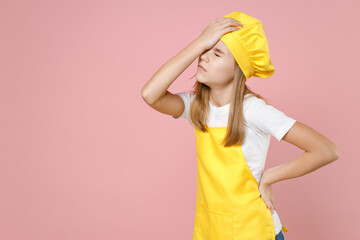 Teen girl chef cook confectioner baker housewife mother's helper wearing yellow apron white tshirt...