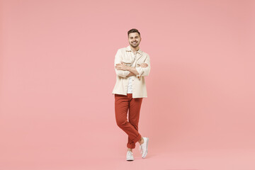 Full length young smiling happy confident joyful fun trendy fashionable caucasian man 20s wearing...