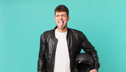 motorbike rider with cheerful, carefree, rebellious attitude, joking and sticking tongue out,...
