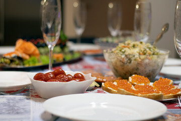 Festive table, table setting, the table is beautifully decorated with different dishes.