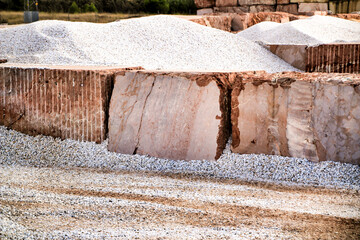 Naklejka premium Colorful construction aggregate mountains in Spain