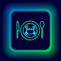 Glowing neon line Served crab on a plate icon isolated on black background. Colorful outline concept. Vector