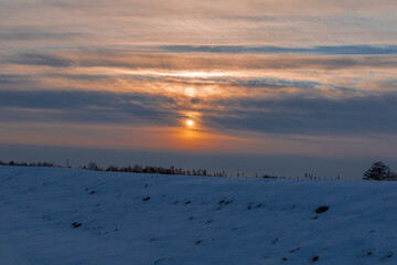 Naklejka premium sunset in the snow