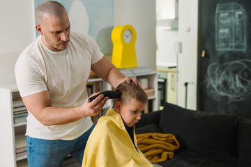 father haircut his son at home