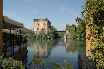 Fototapeta premium View from Borghetto to the Ponte Visconteo over the Mincio River; Italy; Verona