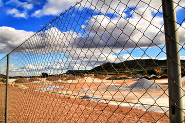 Colorful construction aggregate mountains in Spain
