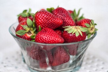Cup full of red strawberries