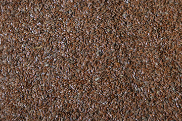 The surface of flax seeds. Copy space. 