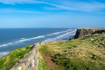 Mussenden Temple and Benone Beach in Castlerock, coast of Atlantic Ocean in Northern Ireland 