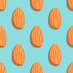 Seamless pattern with almonds. Cute print with nuts on a blue background. Food and snacks icon