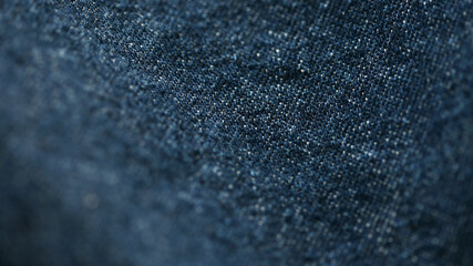 Jeans denim texture close up , focus only one point , soft blured background wallpaper
