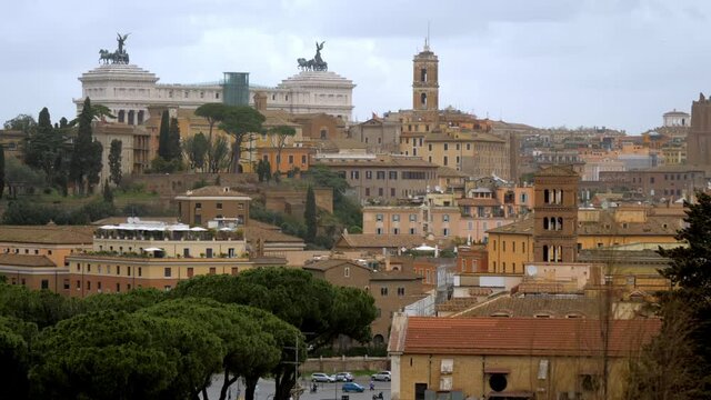 Panoramic view on the historic part of Rome, rich with its architectural monuments, antique and huge constructions, seen from the Aventine Hill