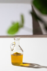 Virgin  olive oil  bottle on white background. . It is one of the important  ingredients in Mediterranean cuisine and perfect for healthy diet