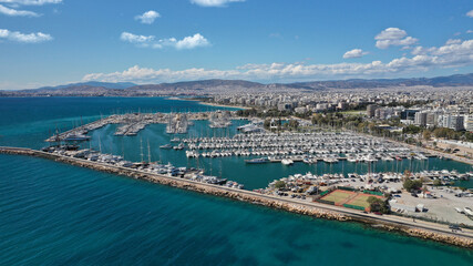 Aerial drone photo of beautiful Marina of Alimos with many luxury yachts and sail boats anchored,...