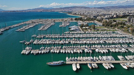 Aerial drone photo of beautiful Marina of Alimos with many luxury yachts and sail boats anchored,...