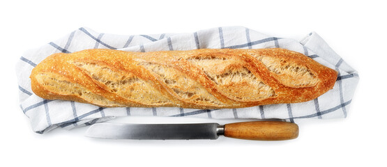Sourdough baguette with knife isolated on white background, top view.
